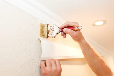 Pose de papier peint à Villers-Brûlin — revêtements muraux et toiles de verre